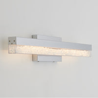 Artika Riviera 27-in LED vanity light bar with chrome finish and clear textured glass adds elegance to any bathroom wall.
