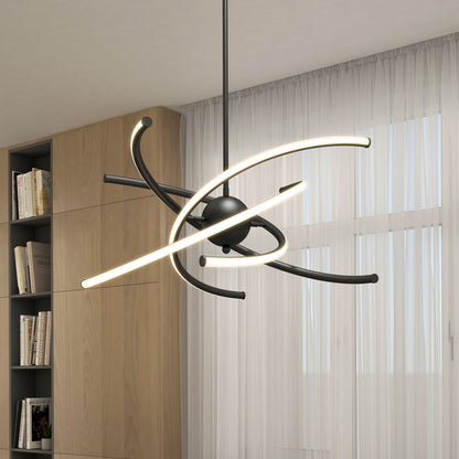 A modern chandelier with curved, glowing LED light bars and a black central sphere hangs from the ceiling in a room with large windows, sheer curtains, and a wooden bookshelf.