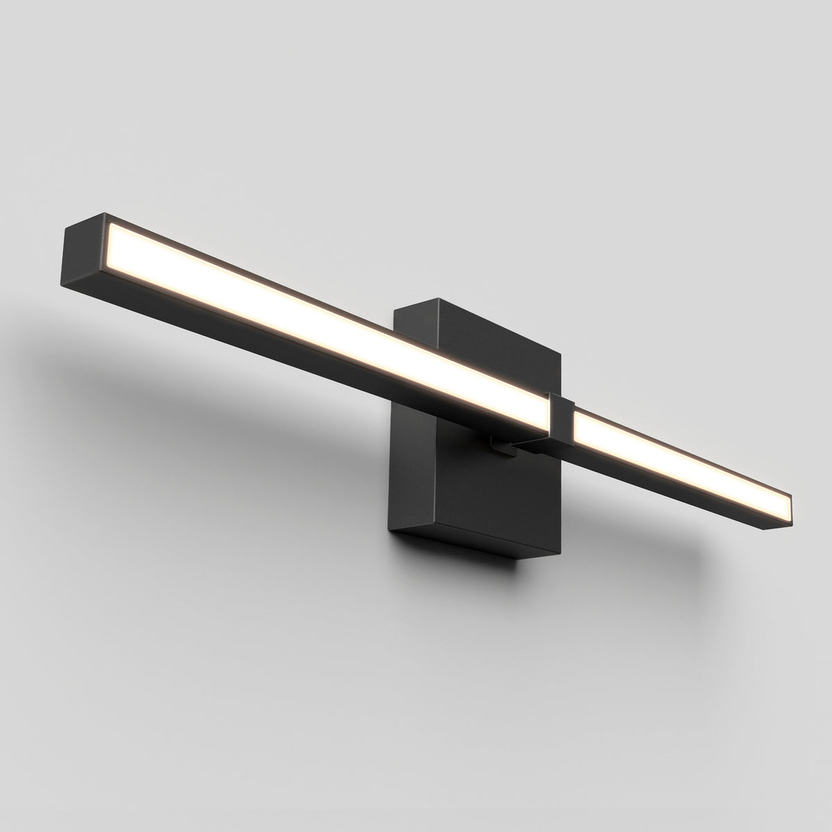 A modern, rectangular wall-mounted LED light fixture with a sleek black finish and a horizontal illuminated bar against a plain white wall.