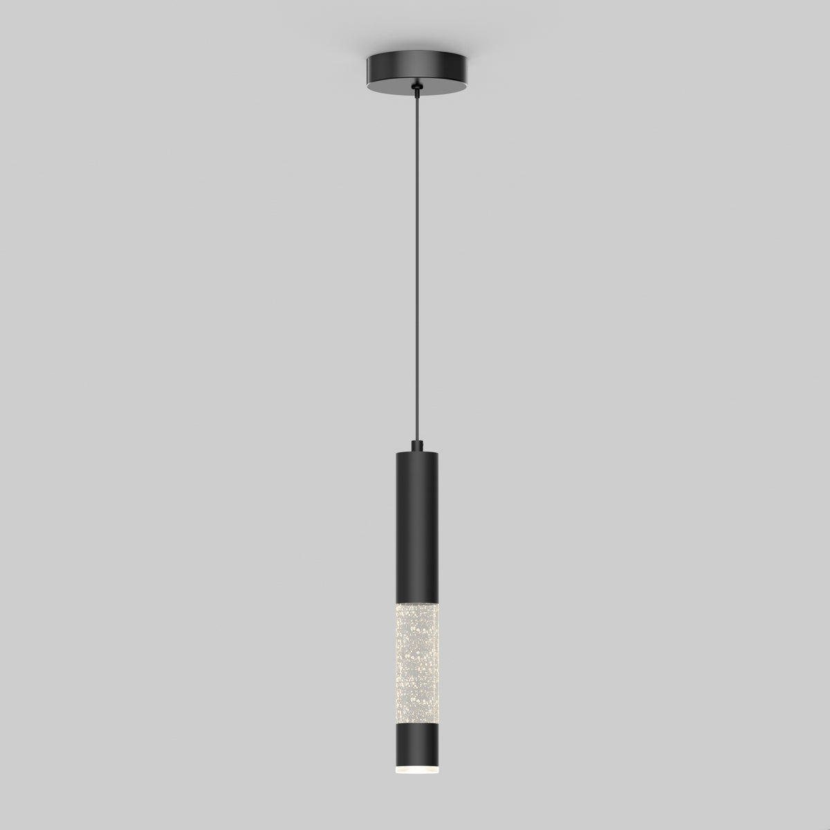 A modern pendant light with a black cylindrical fixture, hanging from a thin black cord, featuring a section with a textured or crystal-like surface near the bottom, set against a plain gray background.