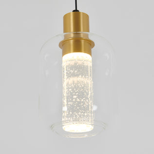 The Artika Champagne Globe modern LED pendant light features a clear glass shade with small bubbles, a cylindrical gold fixture, and a glowing light inside.