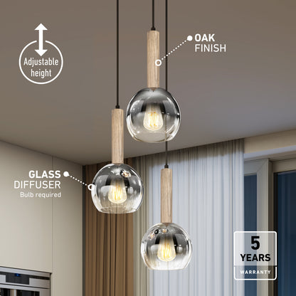 The Ardel Spiral 3-Light Pendant by Artika features oak finish and clear glass diffusers at varying heights. Icons highlight its adjustable height, oak finish, glass diffusers, and include a 5-year warranty. Bulbs not included.