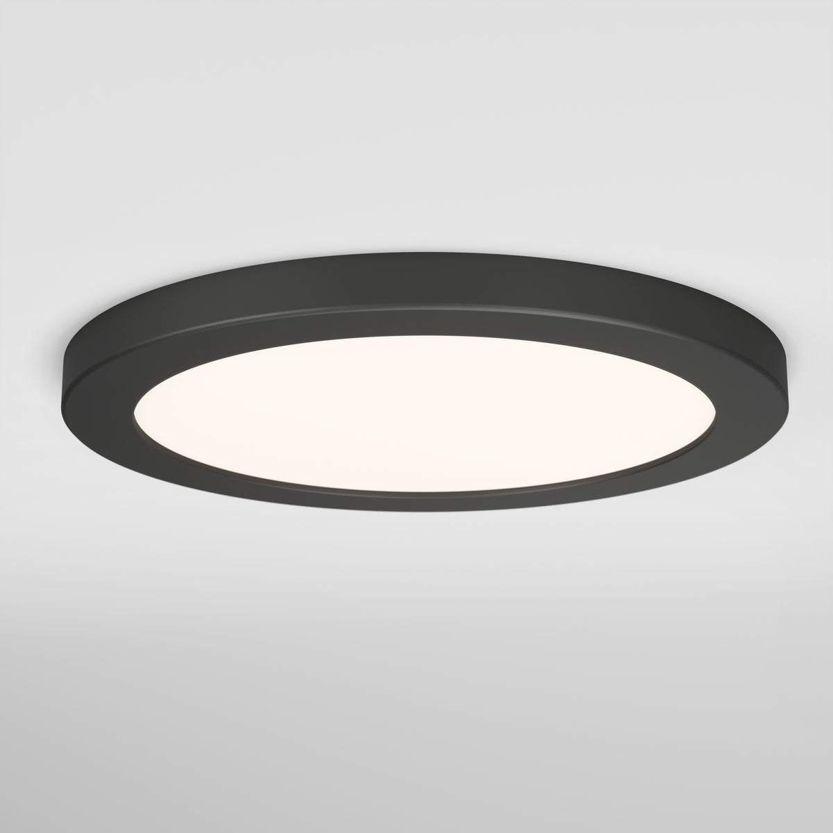 The Artika Europa Disk 9 in. LED modern flush mount light features a black frame and white illuminated center, offering a sleek look for any plain white ceiling. This fixture is 3 CCT adjustable for customizable lighting.