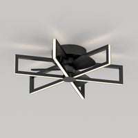 The Artika Swirl 26 in. LED modern ceiling fan features a black geometric frame with three blades set inside intersecting rectangles, mounted on a white ceiling. It includes 3 speeds and a remote control.