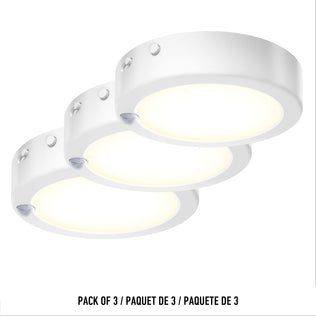 Three round Accent under cabinet LED lights (3CCT) by Artika are displayed in a staggered arrangement on a white background. Text below reads: PACK OF 3 / PAQUET DE 3 / PAQUETE DE 3.