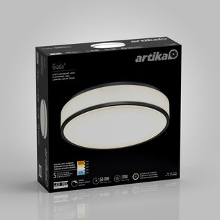 A black box displays the Artika Giada 15 in. LED modern flush mount light 5 CCT. The front shows the circular fixture with white and black details and features like a 50,000-hour lifespan, 1700 lumens, and a 5-year warranty.