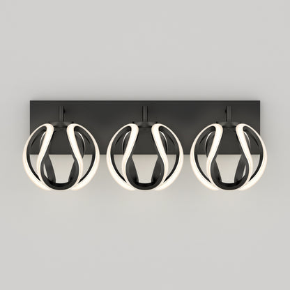 The Artika Vivaldi LED contemporary bathroom vanity light features three spherical black lamp heads, each with a glowing LED strip, mounted on a rectangular black base—perfect for modern settings.