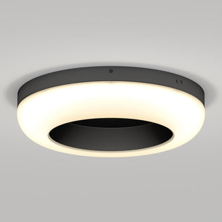 Artika Louka 15″ Modern LED flush mount features a black ring and white halo, elegantly set on the ceiling.
