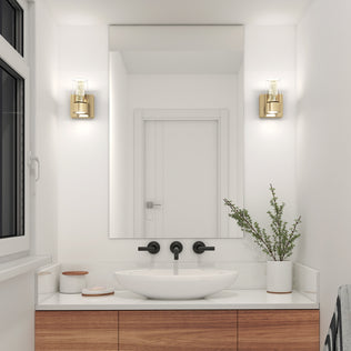 Modern bathroom with a round vessel sink, wooden cabinet, large mirror, and Artika Essence 1-light LED vanity light over a potted plant.