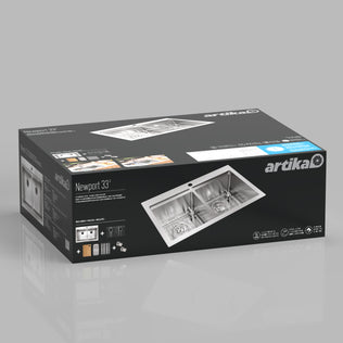 A black and gray box displays the Artika Newport twin bowl 33 in. stainless steel workstation sink, with images of the sink, brand logo, and product details on the packaging.