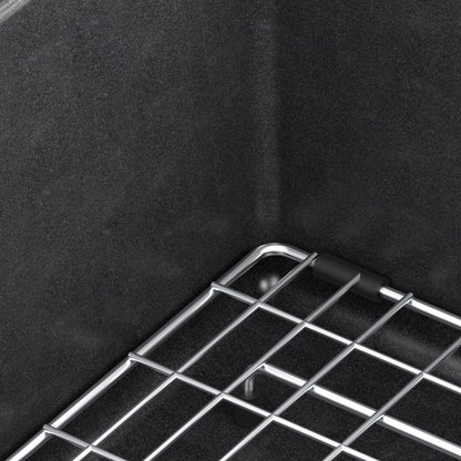 An Artika Baycrest 31 in. Modern Sink features a metal rack with rubber feet in its dark, textured black basin.