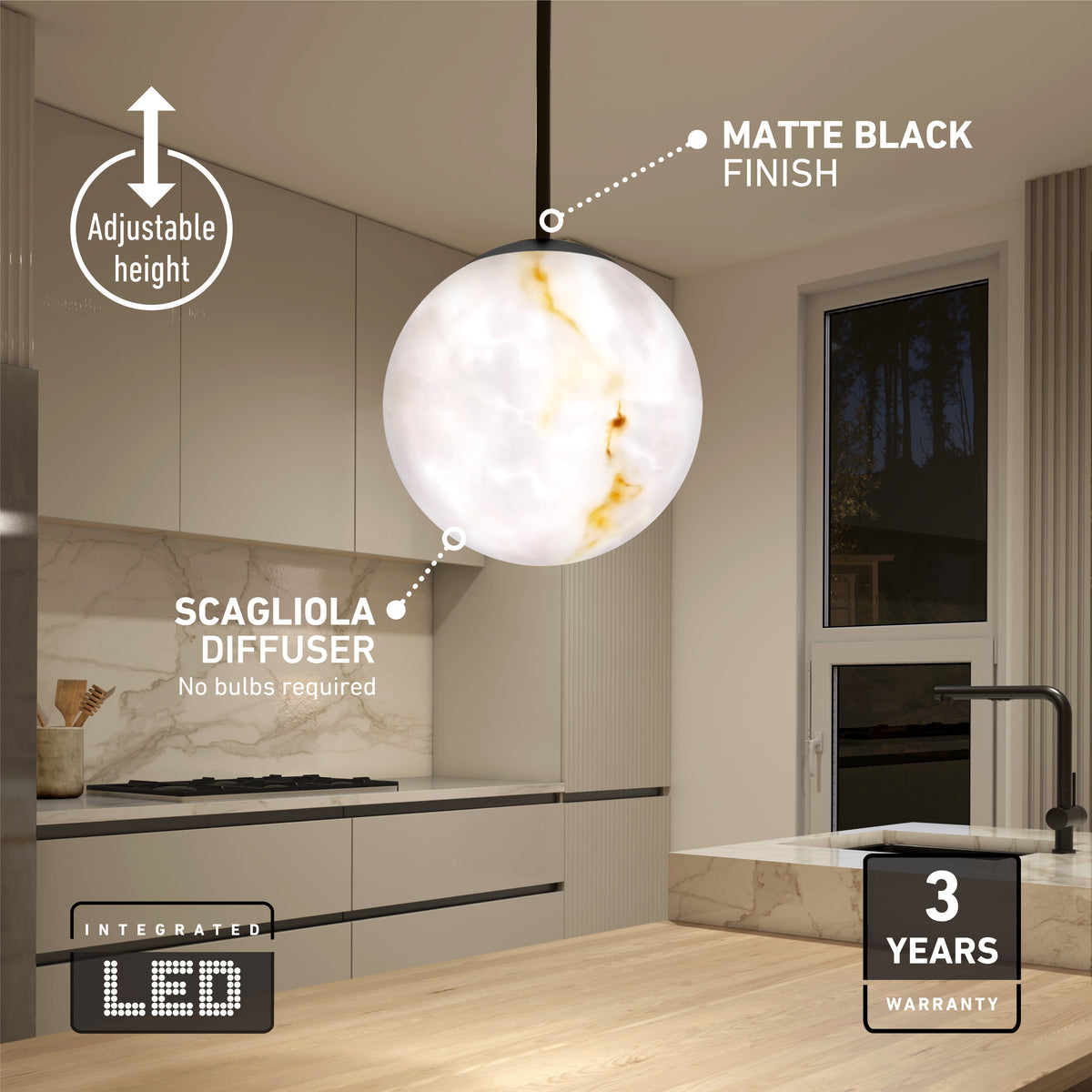 Modern kitchen with a round, marble-like pendant light labeled as having a matte black finish, adjustable height, scagliola diffuser, integrated LED, and a 3-year warranty. No bulbs required.
