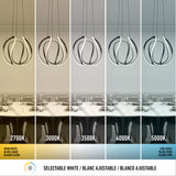 A dining table under five pendant lights, each sectioned to show different white light temperatures: 2700K (warm), 3000K, 3500K, 4000K, and 5000K (cool), ranging from warm to cool tones.
