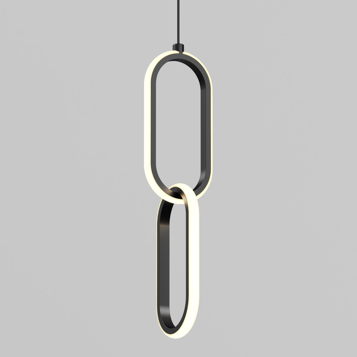 The Catena LED pendant light by Artika features two large, oval loops with black frames and illuminated white inner edges, suspended from a black cord against a plain gray background.