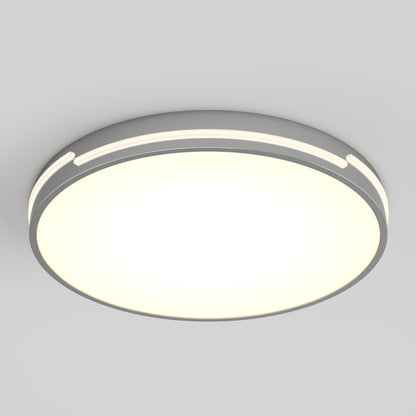 The Artika Delray 15.7 in. LED modern flush mount light features a white illuminated center, a silver-gray rim, and 5 selectable color temperatures, mounted on a plain light-gray ceiling.