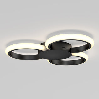 The Artika Nyala 15 in. LED flush mount light features three overlapping circular LED rings on a sleek black frame, offering modern style and 5CCT options.