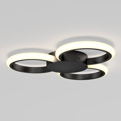 The Artika Nyala 15 in. LED flush mount light features three overlapping circular LED rings on a sleek black frame, offering modern style and 5CCT options.