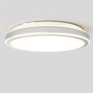 The Artika Altitude 15 in. LED modern flush mount light features a smooth white surface with metallic accents and adjustable 5 CCT, providing a bright, even glow to suit any mood against a plain light gray background.