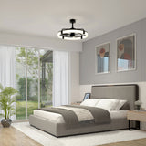 Modern bedroom with a gray upholstered bed, white and gray bedding, two abstract art pieces above the headboard, a geometric ceiling light, a large window with sheer curtains, and a potted plant in the corner.