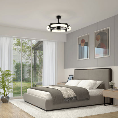 Modern bedroom with a gray upholstered bed, white and gray bedding, two abstract art pieces above the headboard, a geometric ceiling light, a large window with sheer curtains, and a potted plant in the corner.