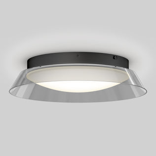 The Artika Arthur modern LED flush mount light 5 CCT features a black circular base, white diffuser, and clear outer rim. Mounted on a light gray ceiling, it emits a soft, even glow for contemporary spaces.