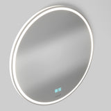 A round, wall-mounted mirror with a built-in LED light ring around the edge and two touch-sensitive control buttons visible on the surface. The background is plain and light gray.
