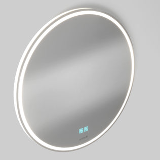 Artika Emeraude 24x24 in. anti-fog LED mirror with blue touch icons, on a light gray wall.
