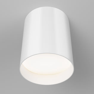 The Artika Radius LED flush mount light 3 CCT, in modern matte black, is shown turned on, casting a soft glow on a light gray ceiling. Its adjustable color temperature lets you create the perfect ambiance for any space.