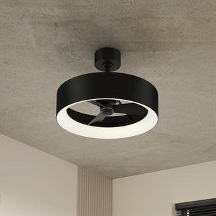 The Artika Aiden 24 in. LED modern ceiling fan features three speeds and an enclosed light ring, and is mounted on a concrete ceiling in a contemporary room. It comes with a remote for easy control.