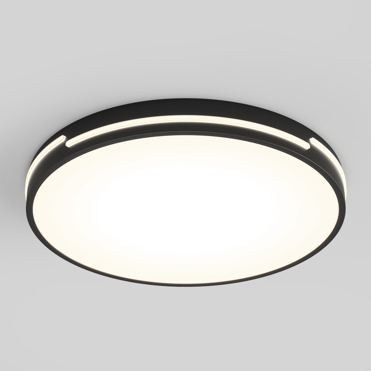 A modern, circular ceiling light fixture with a black rim and a smooth, glowing white center, mounted on a plain light gray ceiling.