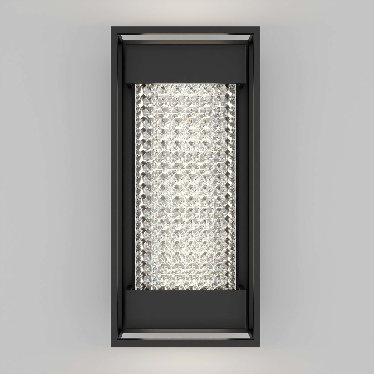 Rectangular wall sconce with a black frame and a center panel filled with rows of sparkling, crystal-like elements, mounted on a light gray wall. The fixture emits a soft, elegant glow.