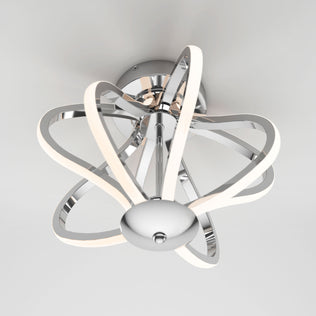 The Artika Meridian LED flush mount light features a chrome finish base and curved LED strips in an abstract, sculptural design, perfect for adding modern style to a white ceiling.
