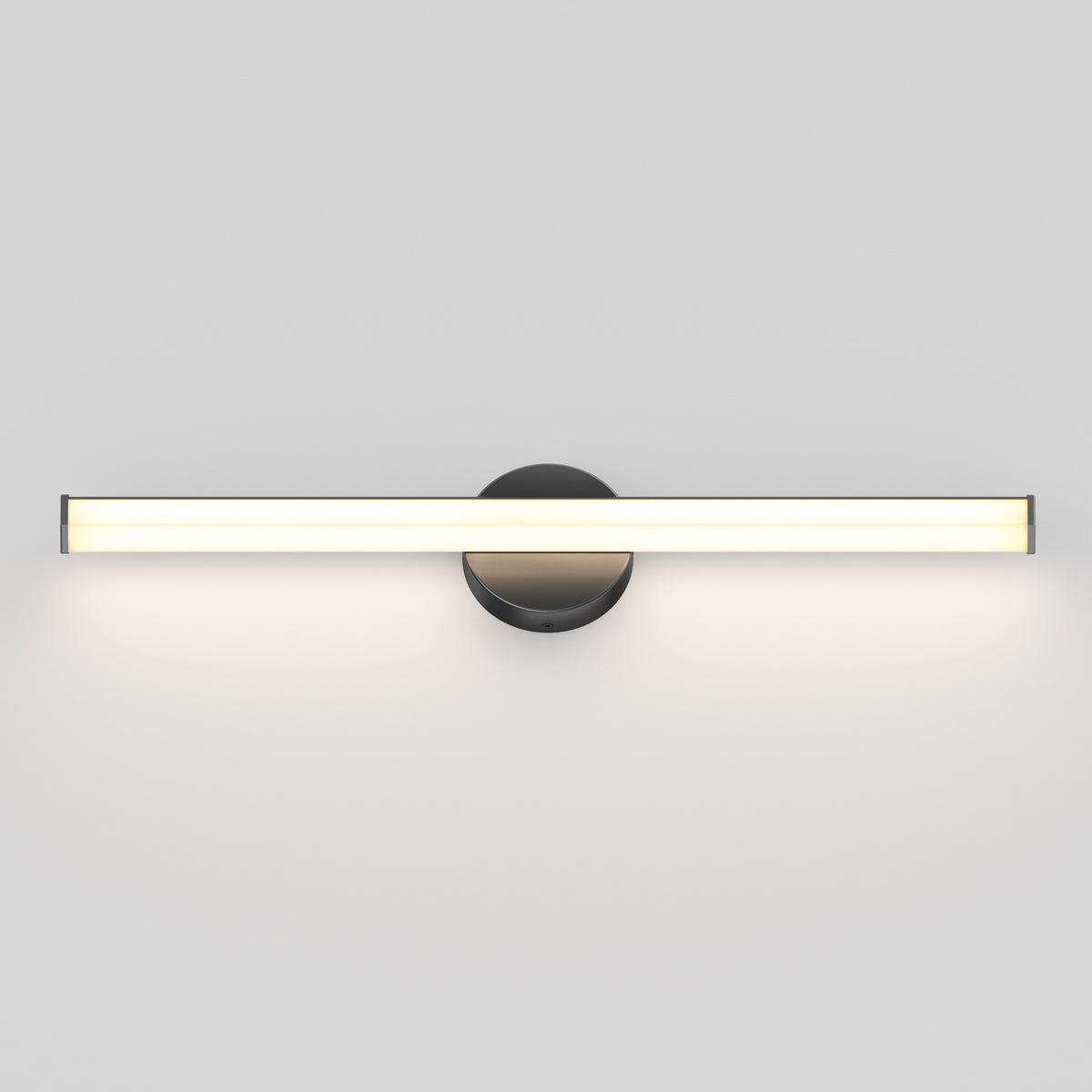 A modern wall-mounted LED light fixture with a horizontal, slim, rectangular design and a circular base, emitting a bright, even light against a plain white wall.