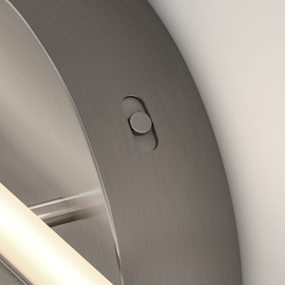 Close-up of the Artika Cisco modern LED bathroom vanity light 5 CCT, featuring a brushed metal finish and recessed toggle switch, mounted on a light wall—ideal for adjustable color-balance in bathroom lighting.