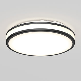 The Artika Hemisphere 15 in. LED Flush Mount, 5 CCT, is ideal for bathrooms with light gray ceilings and features sleek black trim.