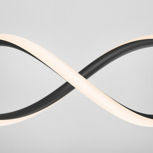 A close-up of two intertwined DNA Linear LED modern pendant lights by Artika, forming an abstract infinity symbol against a plain light gray background.