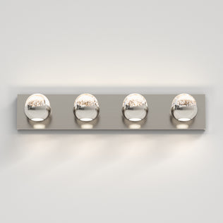 The Artika Oracle 4 light LED bathroom vanity light features a modern design, perfect for stylish bathrooms with white walls.