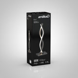 A black product box displays the Artika Wave LED table lamp, featuring a modern, twisted light design on the front, with product details and icons shown near the base.