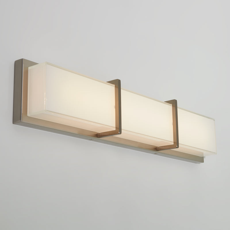 Artika Subway modern LED bathroom vanity light features three frosted glass shades and a brushed metal base for stylish bathroom lighting.