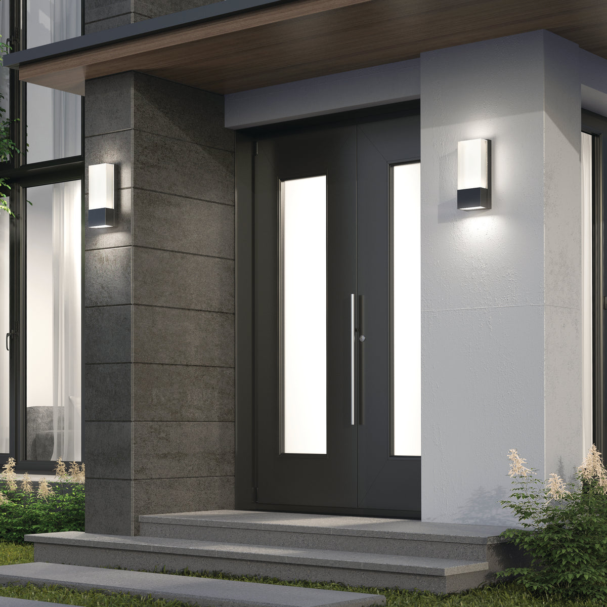 Modern front entrance with a dark door featuring vertical frosted glass panels, flanked on both sides by Artika’s Dixon indoor-outdoor LED wall lights, concrete steps leading up, and small plants adding a contemporary touch.