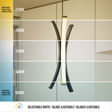 Modern pendant light hanging in a room, shown at different color temperatures from warm white (2700K) to cool white (5000K). Each section of the image displays a progressively cooler light shade.