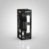 A black Artika Germini LED wall light box with product images, specifications, and features shown on the packaging against a light gray background.