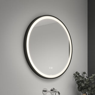 Artika Mateo 28″ LED mirror with 3 CCT, defogger, lit frame above sink; small plant seen on the right.