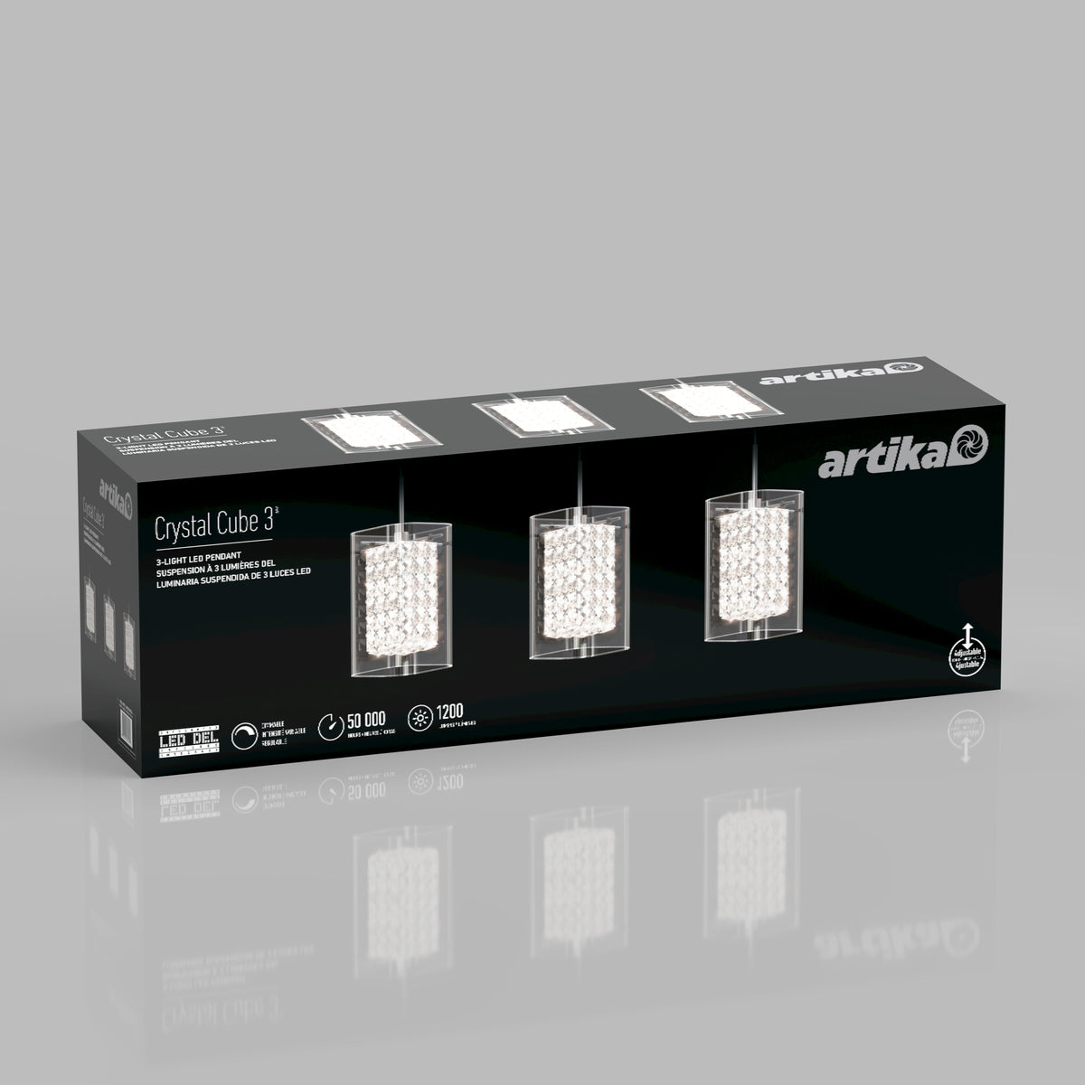 Black product box for Artika Crystal Cube 3 featuring images of three modern pendant light fixtures with crystal details. White text highlights features like LED technology, brightness, and energy efficiency.