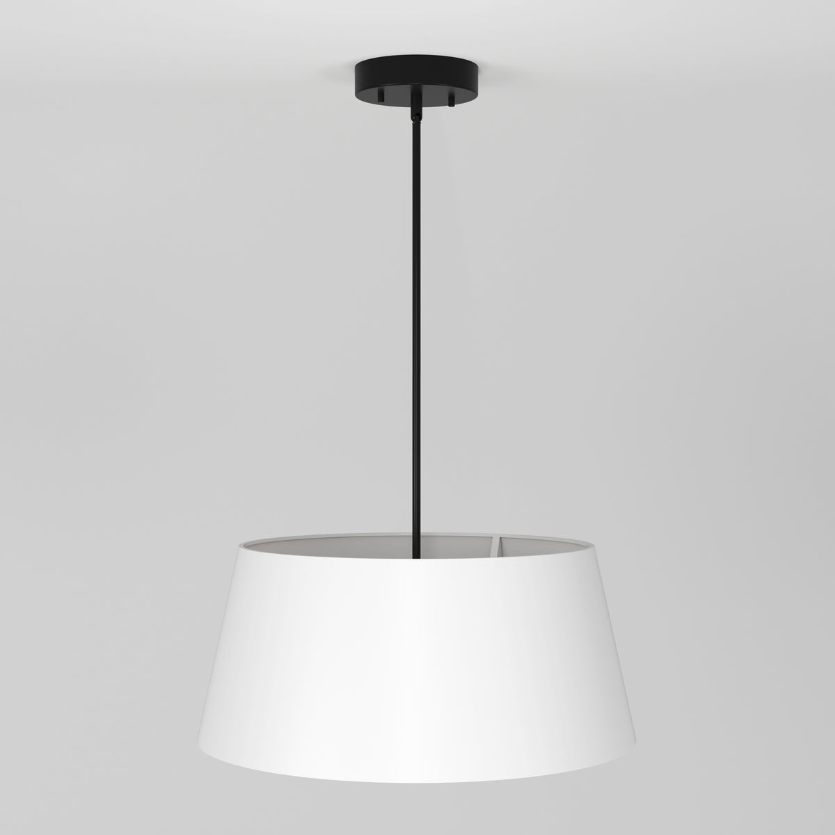 A modern ceiling pendant light with a black rod and a wide, white lampshade hanging from a white ceiling against a plain gray background.