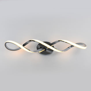 The Artika Swirl modern LED bathroom vanity light features two intertwined, wave-like metal arms with integrated LEDs, mounted on a circular base against a plain light gray background.