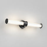 A modern wall-mounted light fixture with two cylindrical, clear glass light tubes extending horizontally from a central black circular base against a light gray wall.