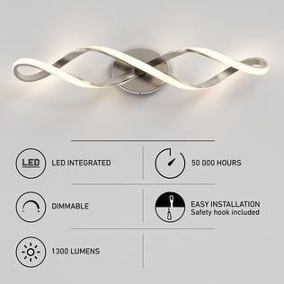 The Swirl LED bathroom vanity light by Artika offers modern, wavy style in brushed metal, with integrated LED (50,000 hrs), 1300 lumens, dimmable lighting, easy installation, and a safety hook.
