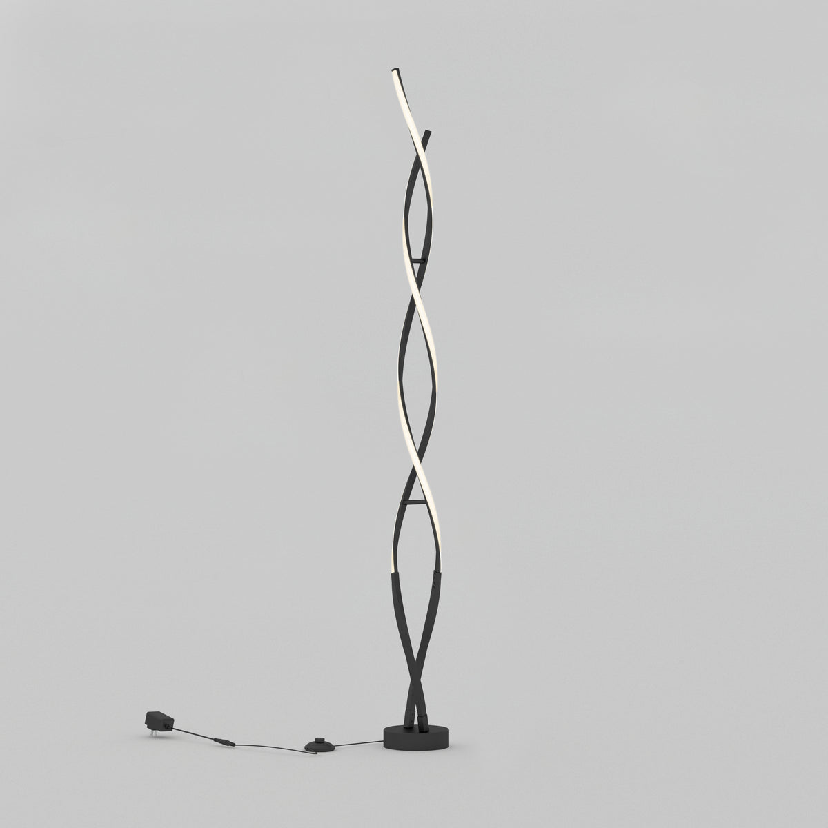 The Artika Swirl modern LED floor lamp features two intertwined wavy light strips on a circular black base, with the power cord and plug visible on the left side against a plain light gray background.