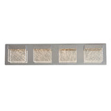 A modern wall-mounted light fixture with four square lights set in a rectangular chrome base, each featuring a bubble glass design that disperses light evenly.
